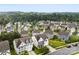 Desirable neighborhood featuring well-maintained homes with lush green lawns surrounded by mature trees and landscaping at 537 Lakeview Dr, Mcadenville, NC 28101