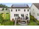 Rear exterior with a deck, patio and a well-manicured lawn at 537 Lakeview Dr, Mcadenville, NC 28101