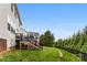 Grassy backyard featuring a multi-level deck perfect for entertaining at 537 Lakeview Dr, Mcadenville, NC 28101