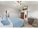 A Primary bedroom with a ceiling fan, TV, ensuite bathroom, and walk-in closet at 537 Lakeview Dr, Mcadenville, NC 28101