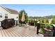Back deck with composite decking material and relaxing chairs to enjoy the outdoors at 537 Lakeview Dr, Mcadenville, NC 28101