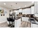 Modern kitchen features stainless steel appliances, a large island and white cabinetry at 537 Lakeview Dr, Mcadenville, NC 28101