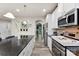 View of the kitchen featuring stainless steel appliances and a breakfast bar at 537 Lakeview Dr, Mcadenville, NC 28101