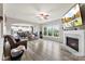 Open-concept living space featuring a fireplace, hardwood floors and an open kitchen at 537 Lakeview Dr, Mcadenville, NC 28101