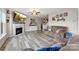 Bright living room featuring a fireplace, hardwood floors and neutral decor at 537 Lakeview Dr, Mcadenville, NC 28101