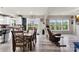 Open-concept living space featuring a wood dining table, kitchen and living area at 537 Lakeview Dr, Mcadenville, NC 28101