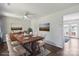 Charming dining room with stylish decor, hardwood floors, and ample seating at 6516 Laurel Springs Ct, Charlotte, NC 28227