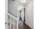 Inviting foyer featuring hardwood floors, a staircase, and natural light at 6516 Laurel Springs Ct, Charlotte, NC 28227