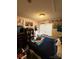 Bedroom with a bed, dark dresser, and light at 6902 Vernon Wood Ln, Charlotte, NC 28262