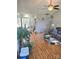 Spacious living area with hardwood floors, lots of light, and comfortable seating at 6902 Vernon Wood Ln, Charlotte, NC 28262