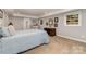 Finished basement bedroom with carpet, a window, and a built-in desk at 6935 Woodstock Dr, Charlotte, NC 28210