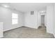 Bright bedroom with large window and neutral carpeting, freshly painted and ready to be moved in at 7214 Fox Point Dr, Charlotte, NC 28269