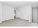Upstairs bonus room featuring neutral carpet, fresh paint, and bright natural light at 7214 Fox Point Dr, Charlotte, NC 28269