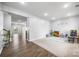 Spacious bonus room includes hardwood flooring, recessed lighting, and an open concept design at 7263 Waterwheel Sw St, Concord, NC 28025