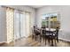 Cozy dining area with a wooden table set and natural light at 7263 Waterwheel Sw St, Concord, NC 28025