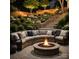 Inviting backyard with a stone fire pit, comfortable seating, and ambient lighting for cozy outdoor gatherings at 7810 Leisure Ln, Huntersville, NC 28078