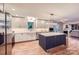 Modern kitchen with white cabinets, stainless steel appliances, and a center island at 7810 Leisure Ln, Huntersville, NC 28078