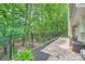 Stone patio overlooking a lush yard at 7810 Leisure Ln, Huntersville, NC 28078