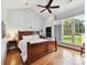 Spacious bedroom with large window and hardwood flooring at 8026 Greenview Terrace Ct, Charlotte, NC 28277