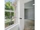 Bright bedroom with a view of the backyard and a neutral color palette at 8304 Prescott Glen Pkwy, Waxhaw, NC 28173
