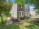 Charming two-story home with a well-manicured lawn, landscape beds, and a side entry garage at 8304 Prescott Glen Pkwy, Waxhaw, NC 28173