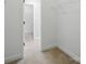 A walk-in closet with shelving, offering ample space for organized storage of your wardrobe at 8304 Prescott Glen Pkwy, Waxhaw, NC 28173