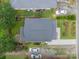 Aerial view showcasing the house, roof, yard, cars, landscaping, and surrounding neighborhood at 904 Anderson St, Charlotte, NC 28205