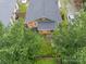 Overhead view of a well-maintained property with mature trees and a spacious backyard at 904 Anderson St, Charlotte, NC 28205