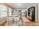 Stylish dining area with modern table, chairs, and open access to kitchen at 904 Anderson St, Charlotte, NC 28205