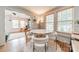 Elegant dining area with round table and seamless flow to living room, great for entertaining at 904 Anderson St, Charlotte, NC 28205