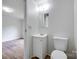 Bathroom with updated vanity, mirror, and fixtures at 976 Neely Store Rd, Rock Hill, SC 29730