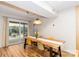 Dining room with a large table and chairs and a sliding glass door to the backyard at 10209 Green Tee Ln, Charlotte, NC 28277