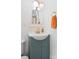 Charming bathroom with a basin sink, vintage-inspired fixtures, and a soft, inviting color palette at 1072 5Th Ne St, Hickory, NC 28601