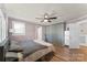 Spacious bedroom with wood floors, a ceiling fan, and ample closet space at 1072 5Th Ne St, Hickory, NC 28601
