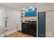 Well-organized laundry room with modern appliances, custom cabinets, and ample storage space at 1072 5Th Ne St, Hickory, NC 28601