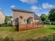 Spacious back deck perfect for outdoor entertaining and relaxation at 1090 Mclaren Dr, Belmont, NC 28012