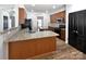 Kitchen featuring granite countertops, stainless steel appliances and warm wood cabinetry at 1090 Mclaren Dr, Belmont, NC 28012