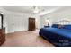 Spacious bedroom with ceiling fan, closet, and ensuite bathroom at 111 Kelly Ln, Gastonia, NC 28056