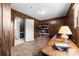 Cozy bedroom with wood paneling and built-in bookshelves, providing a warm, inviting space at 111 Kelly Ln, Gastonia, NC 28056