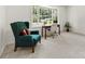 Bright living room featuring a large bay window overlooking the well-manicured front yard at 111 Kelly Ln, Gastonia, NC 28056