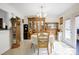Open dining room with hardwood furniture and tile flooring, perfect for Gathering gatherings and entertaining guests at 1116 Crestview Dr, Salisbury, NC 28146