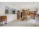Elegant dining area with tile floors, hardwood furniture, and natural light creating a warm and inviting atmosphere at 1116 Crestview Dr, Salisbury, NC 28146