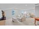 Large bedroom with ample space for seating area, bedroom furnishings and natural light at 12615 Es Draper Dr, Huntersville, NC 28078