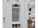 Well-organized entryway with a built-in bench, storage, and a view into the dining area at 12615 Es Draper Dr, Huntersville, NC 28078
