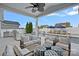Inviting outdoor space with lounge seating, outdoor kitchen, and a refreshing pool for luxurious entertaining at 12615 Es Draper Dr, Huntersville, NC 28078