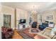 Spacious living room featuring hardwood floors, an ornate ceiling, and plenty of seating at 1282 W Hwy 27 Hwy, Lincolnton, NC 28092