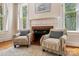 Sitting area featuring two armchairs and a fireplace at 1282 W Hwy 27 Hwy, Lincolnton, NC 28092