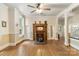 Bright living room boasting a fireplace, hardwood floors, and decorative trim at 1282 W Hwy 27 Hwy, Lincolnton, NC 28092