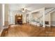 Spacious living room featuring hardwood floors, a fireplace, and staircase at 1282 W Hwy 27 Hwy, Lincolnton, NC 28092