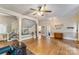 Open-concept living room with hardwood floors, staircase, and neutral tones at 1282 W Hwy 27 Hwy, Lincolnton, NC 28092